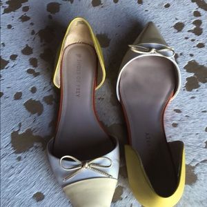 White and orange accents flats